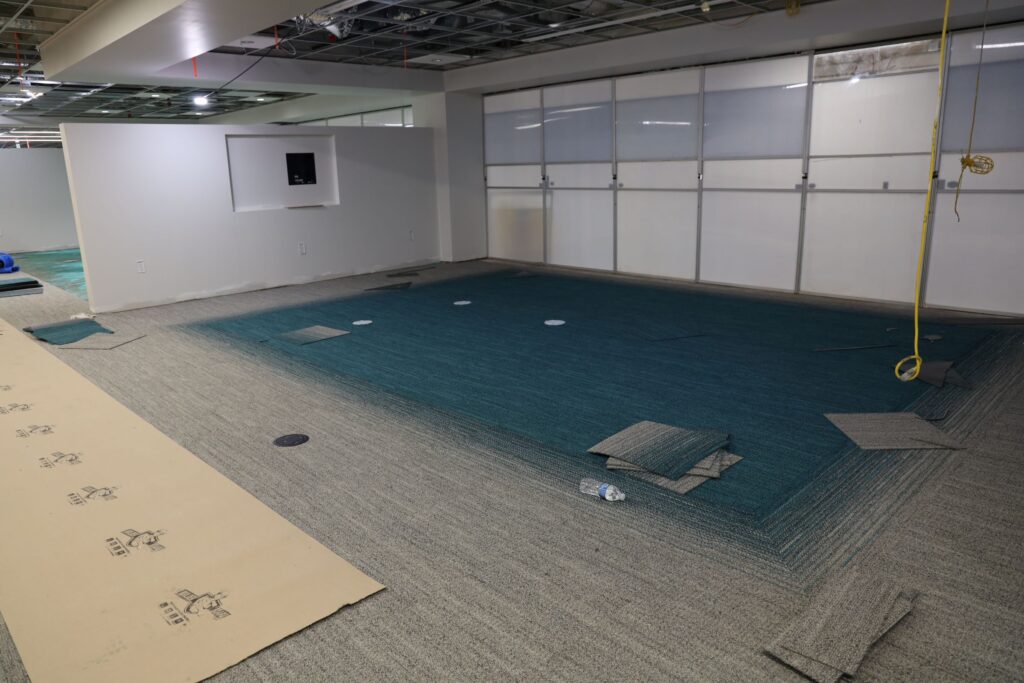 Third Floor, Gibson D. Lewis Library, construction photo displaying new carpeting and lighting