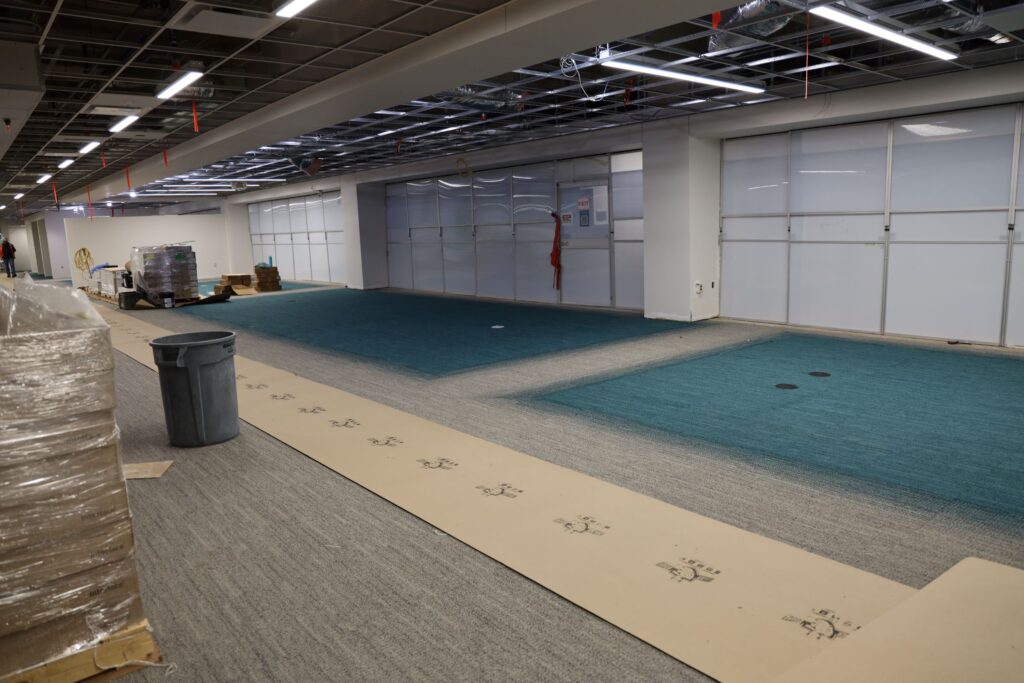 Third Floor, Gibson D. Lewis Library, construction photo displaying new carpeting and lighting